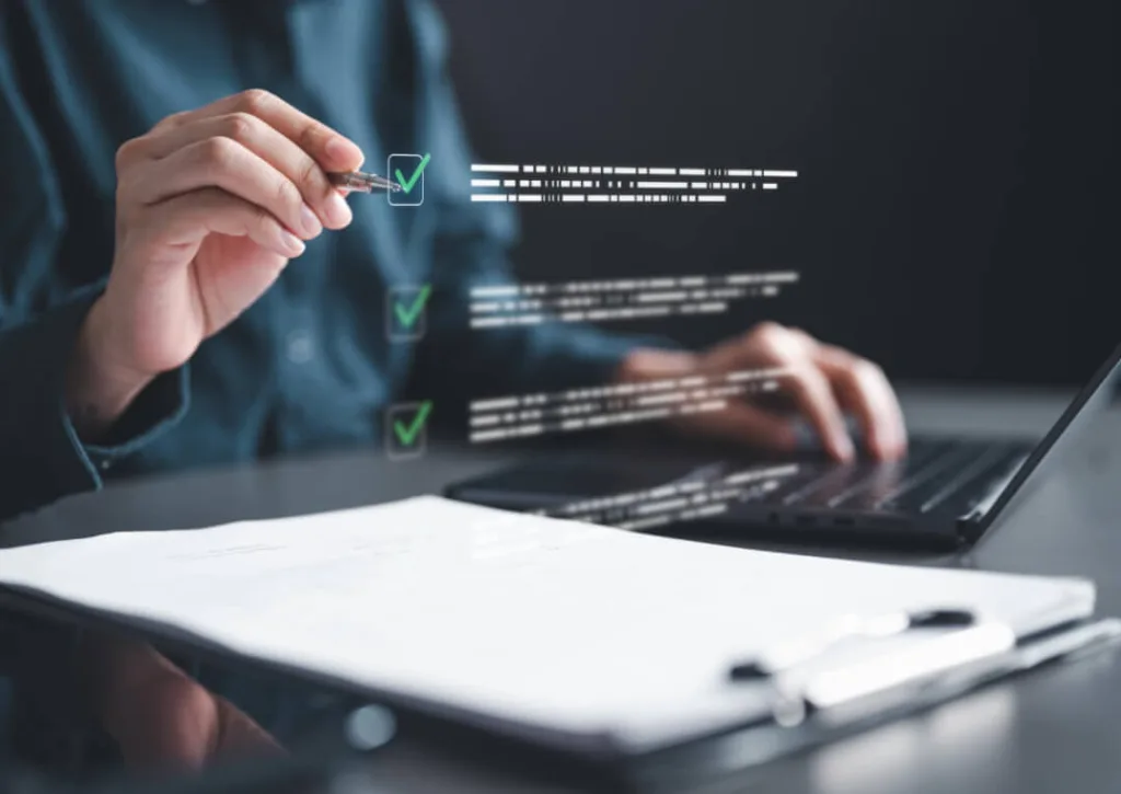 Person completing a digital checklist on a laptop using an online assessment interface.